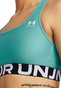 Under Armour MID BRANDED - Sujetadores deportivos con sujeción media - radial turquoise white