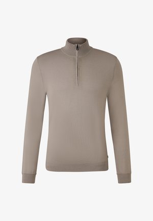 Pull en tricot beige clair à manches longues avec fermeture éclair quart et col, poignets et ourlet côtelés.