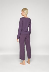Yogasearcher RAVANA FLOWY PANTS - Donji dijelovi trenirke - topaze