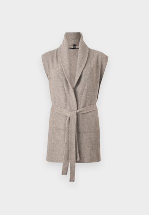 Beige sleeveless cardigan with a shawl collar, ribbed texture, and a matching waist tie belt for closure.