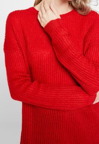QS Striktrøje - red
