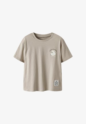 Beige katoenen t-shirt met korte mouwen, ronde hals, voorzien van een ronde grafische print op de borst en een label aan de zoom.