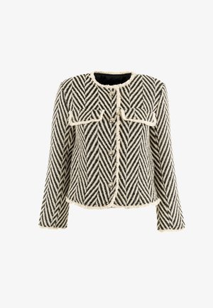 Giacca a scacchi houndstooth in nero e crema, con maniche lunghe, due tasche frontali e orlo sfilacciato con bottoni in argento.