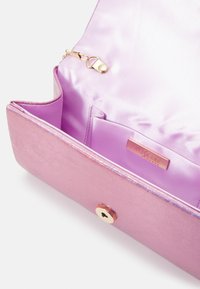Mascara Pisemska torbica - pink
