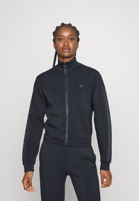 Guess - NEW ALLIE ZIP - Športna jopa s kapuco na zadrgo - dunkelgrau Miniaturna slika 1