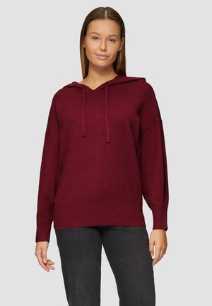 Bordeauxfarbener Kapuzenpullover mit lockerer Passform, langen Ärmeln und gerippten Bündchen, aus weichem Strickmaterial. Mit einem V-Ausschnitt gestaltet.