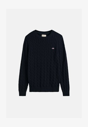Navy cable-knit sweater with a round neckline, ribbed cuffs and hem, featuring a small embroidered logo on the chest.