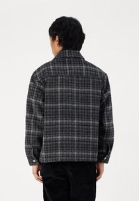 Jack & Jones Tunn jacka - black