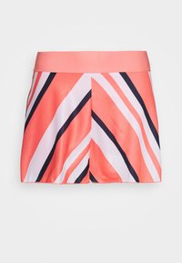 Coral athletic skirt with a wide waistband, featuring diagonal stripes in pink and navy, crafted from a smooth, lightweight fabric.