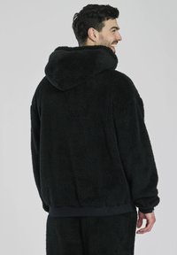 Loungeable HOODED SHERPA TOP - Kapuzenpullover - black