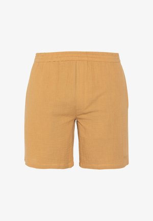 Shorts décontractés marron clair avec une taille élastique et une texture subtile, longueur au genou sans poches apparentes ni décorations.