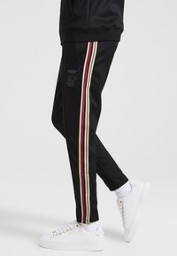 SIKSILK Pantalones deportivos - black