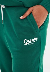 Creeks Trainingsbroek - vert émeraude