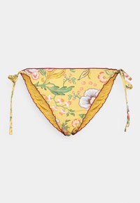 Parte de baixo de biquíni floral em amarelo, com flores verdes e pink. Apresenta uma borda ondulada e laços laterais ajustáveis. Feita em tecido leve.