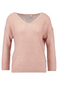 Pull tricoté rose clair avec col en V, manches trois quarts et coupe ample. Présente un tissage texturé et un design minimaliste.