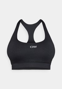 Μαύρο αθλητικό σουτιέν με σχέδιο racerback, κατασκευασμένο από ελαστικό ύφασμα. Διαθέτει ραμμένες λεπτομέρειες και εκτυπωμένο λογότυπο στο μπροστινό μέρος.