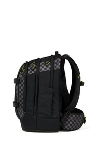 Black backpack with checkerboard pattern accents, multiple compartments, padded shoulder straps, and adjustable buckles shown from side view.