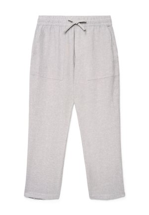Pantaloni della tuta grigio chiaro con vita elastica, coulisse regolabile e due tasche frontali a toppa, distesi su uno sfondo bianco.
