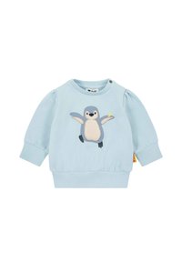 Sudadera azul claro con un aplique de pingüino y un accesorio amarillo, mangas fruncidas y dobladillo acanalado. Dos botones a presión en el hombro.