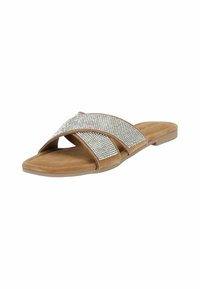 Tan suede slide sandal with crisscross straps adorned with silver rhinestones. Flat sole and open toe design for ease of wear.