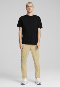 Puma AMG STATEMENT - Camiseta estampada - black
