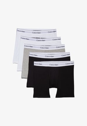 Set di boxer in cotone di Calvin Klein, composto da cinque paia nei colori bianco, grigio e nero. Tessuto morbido con bande elastiche in vita che mostrano il logo del marchio.