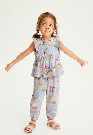 STANDARD - Tracksuit bottoms - blue floral