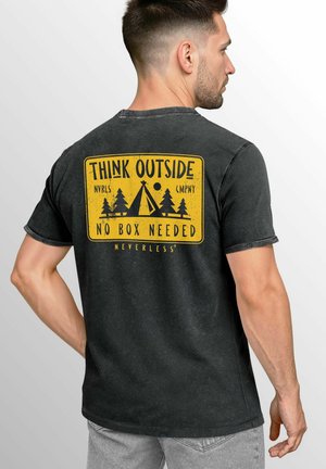 Black cotton t-shirt featuring a yellow graphic with the text "THINK OUTSIDE" and a camping scene, displayed on the back.