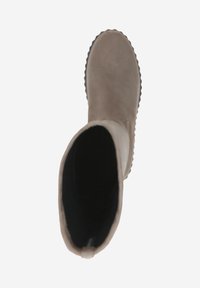 Beige suede knee-high boot with textured rubber outsole, rounded toe, and soft fabric lining. Simple design, no visible hardware.