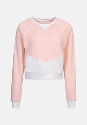Afskåret sweatshirt med en pink øverste sektion og hvid nederste sektion, med V-hals og lange ærmer, lavet af blødt stof.