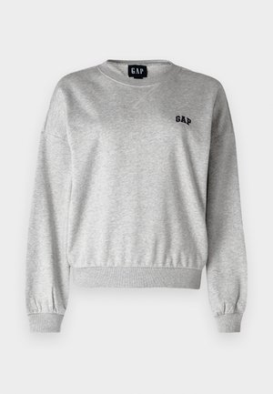 Grauer Sweatshirt mit rundem Halsausschnitt, gerippten Bündchen und Saum. Auf der linken Brust befindet sich ein kleines schwarzes "GAP"-Logo. Weicher Stoff, lässige Passform.