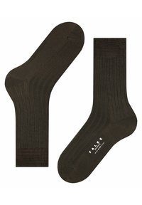 Calcetines acanalados de color verde oliva oscuro con una textura suave, que cuentan con la puntera y el tobillo reforzados, y que están marcados con "FALKE" en blanco en la suela.