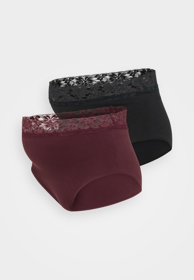 Kaks paari hipster-aluspükse, üks tumesordis pitsäärisega, teine must, sarnaste pitsdetailidega, valmistatud pehmest kangast.