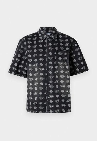 Short-sleeve black denim shirt featuring a pattern of diamond shapes and clouds in gray, with a front pocket and button closure.