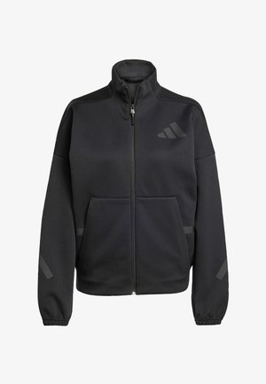Melnā jaciņa ar rāvējslēdzēju, kas izgatavota no mīksta materiāla, ar augstu apkakli, divām priekšējām kabatām un atstarojošiem akcentiem elegantā dizainā.