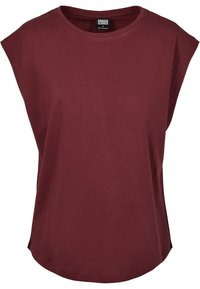 T-shirt sans manches en coton marron foncé, col rond, coupe ample, avec étiquette Urban Classics à l'intérieur du col.
