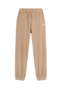 Jogging in beige realizzati in tessuto testurizzato, con una vita elastica, chiusura con cordino e tasche laterali. Presentano un piccolo dettaglio con logo.