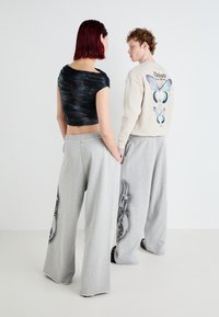 Jaded London TRIBAL AIRBRUSH STAR JOGGER UNISEX - Træningsbukser - grey tribal