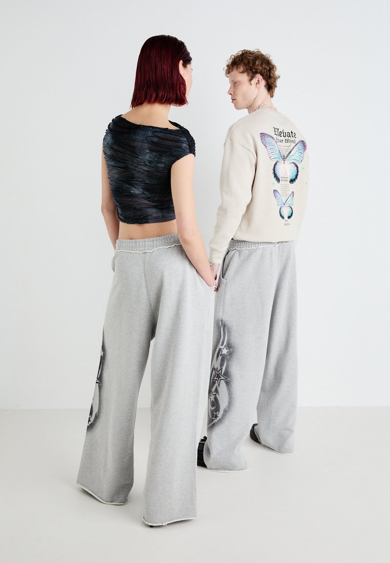 Jaded London TRIBAL AIRBRUSH STAR JOGGER UNISEX - Tracksuit 
