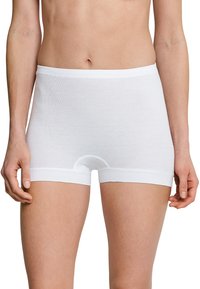 White cotton boxer briefs with a smooth texture, mid-length cut, and elastic waistband. Features a small circular opening on the front.