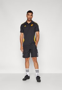 adidas Performance JAMAICA JFF POLO - Polo shirt - black/semi solar ...