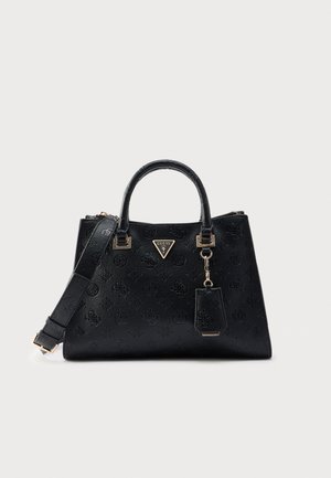 Sac à main en cuir noir texturé avec double poignée, bandoulière réglable et logo Guess doré sur le devant.