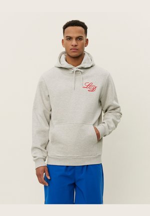 Grey hooded sweatshirt with drawstrings, front pocket, and red logo on the chest. Ribbed cuffs and hem, soft texture. Paired with blue shorts.