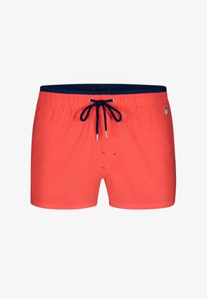 Pantaloni da bagno color corallo con cintura elastica blu navy, cordino regolabile e dettagli in metallo argentato. Presenta un design semplice con apertura frontale.