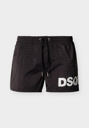 Shorts de bain noirs avec taille élastique et cordon de serrage, motif subtil de logo répétitif, et grand texte blanc "DSQ" sur la jambe droite.