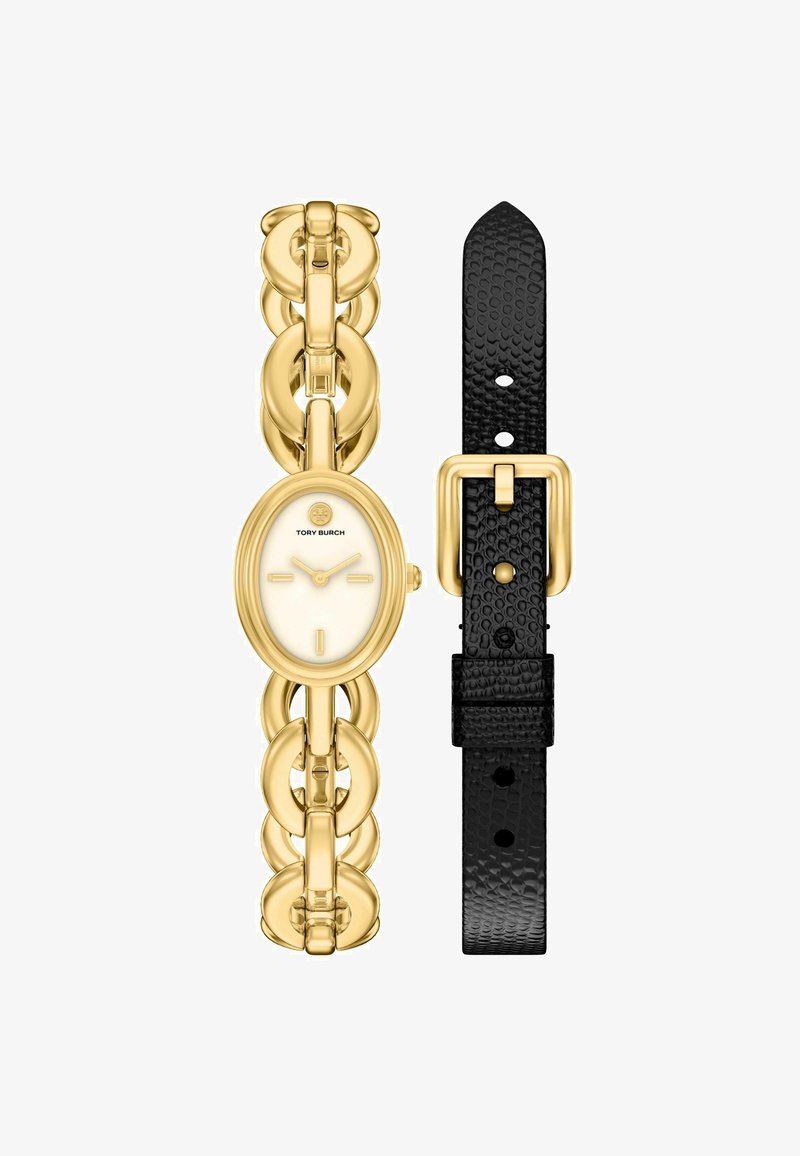 Reloj ovalado Tory Burch dorado con pulsera de cadena enlazada y correa de piel texturizada negra intercambiable con hebilla dorada.