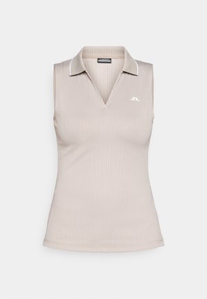 Polo sem mangas em bege claro com um design texturizado. Apresenta um decote em V, gola branca em contraste e um pequeno logótipo no peito.