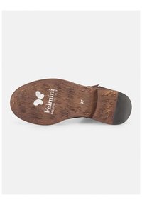 Suela de zapato marrón con patrón de grano de madera texturizado, tacón de goma y logo blanco. Presenta la impresión del tamaño 37.
