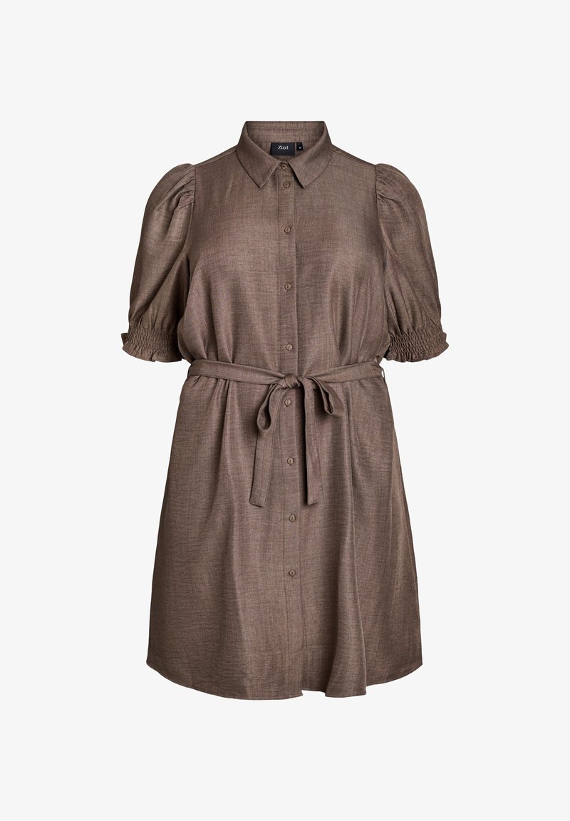 Brūns pogu krekliņš ar pūkainām piedurknēm un jostu viduklī. Izgatavots no teksturēta auduma, ar apkakles izgriezumu un brīvu piegriezumu.