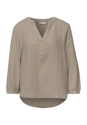 Lysebrun bluse med lange ærmer, V-hals, tekstureret stof og rundet kant, med en løs og afslappet pasform.